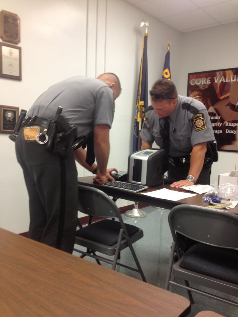 Law enforcement using the Drager Drug Test 5000 during a pilot project in conjunction with NMS Labs in Philadelphia PA.